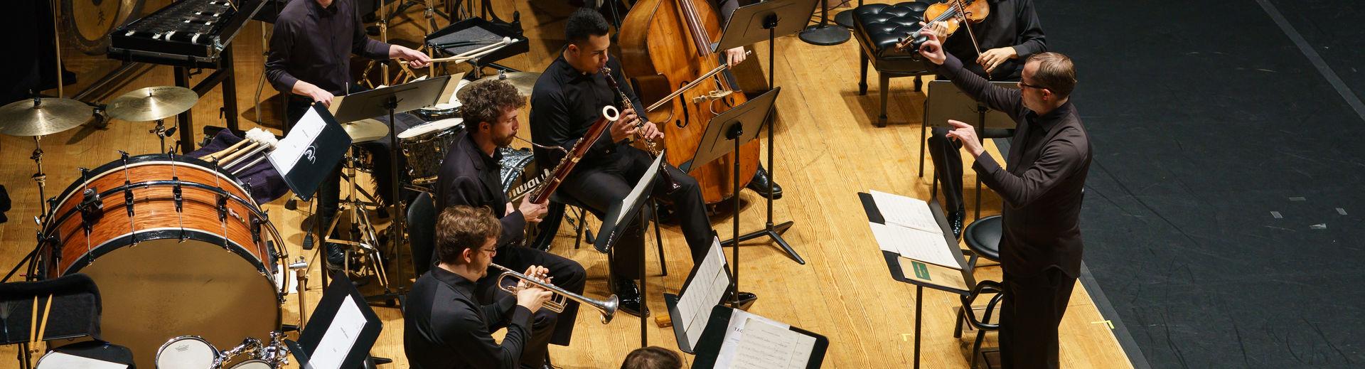 Students playing a concert on stage 